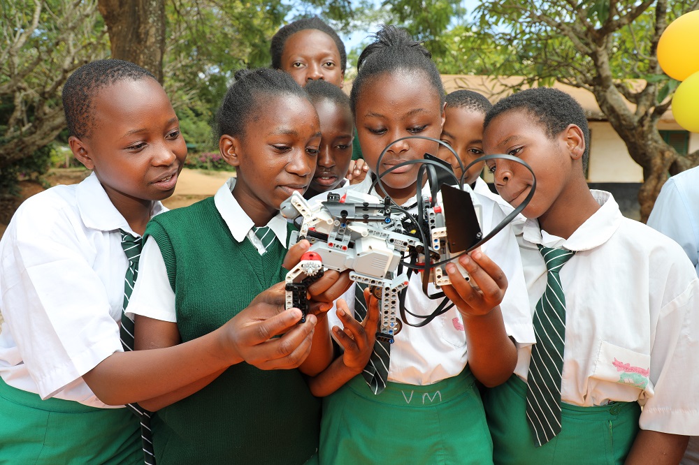 Students at Mulango Girls High School in Kitui County learn how to assemble and operate a robot during a STEM mentorship program organized by CEMASTEA to mark the International Day for Women and Girls in Science.