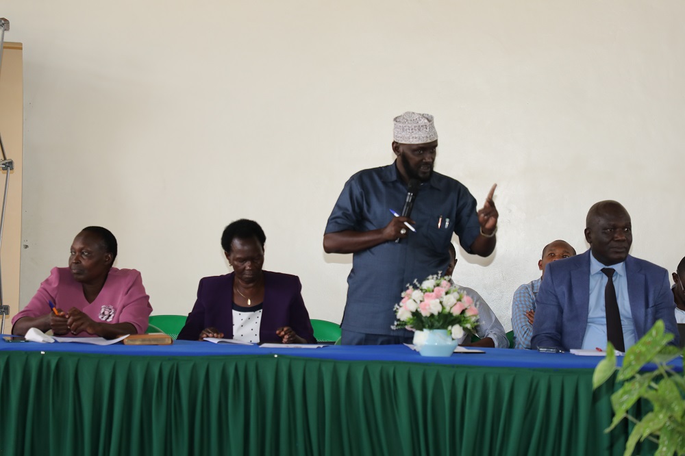 The Director of Education in Kitui County Dr.Khalif Hassan addressing students and teachers at Mulango Girls High School during STEM mentorship activities organized by CEMASTEA to mark the International Day for Women and Girls in Science.